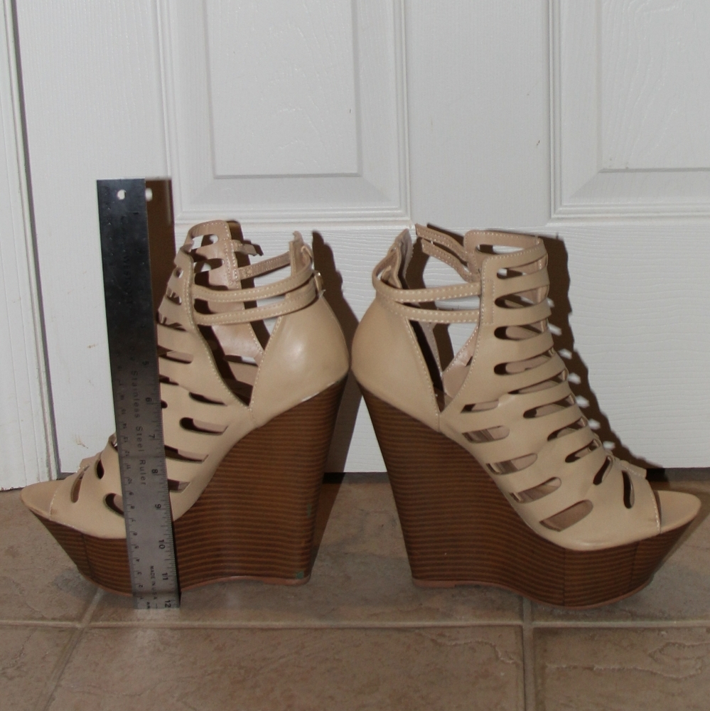 Platform wedge heels over 6 inches called Carra
